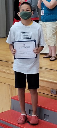 student at fifth grade ceremony