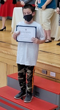 student at fifth grade ceremony