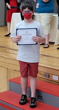 student at fifth grade ceremony