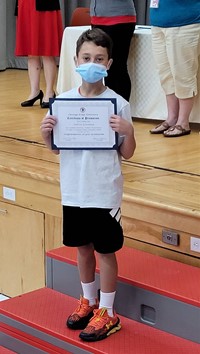 student at fifth grade ceremony