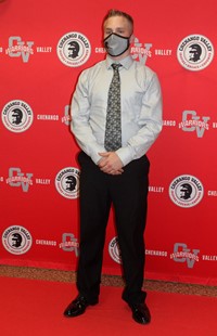 student posing on red carpet