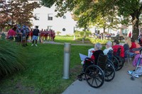 nursing home residents watching pep rally