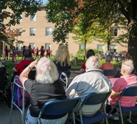 nursing home residents watching pep rally