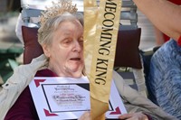 homecoming queen receiving sash