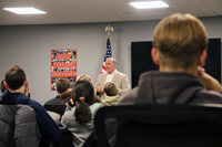 Mr. Clark speaking with students