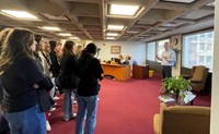 county executive showing students around building