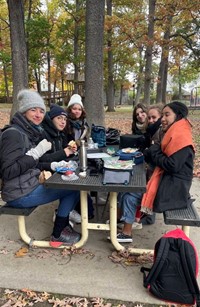 students at recreation park eating lunch