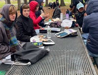 students at recreation park eating lunch