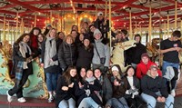 students at recreation park on carousel