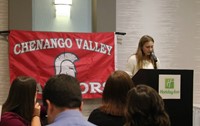 medium shot of student introducing inductee