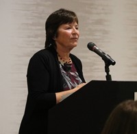 Peg Peters speaking at Alumni Recognition Event