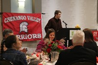 student introducing Merissa Kraham Velez at alumni recognition event