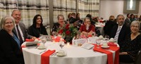 table at alumni recognition event