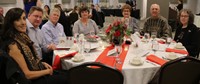 table at alumni recognition event