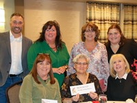 table at alumni recognition event