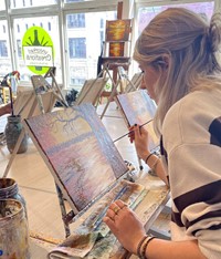 students painting