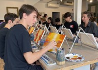 students painting
