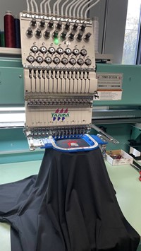 machine embroidering shirt