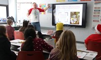 fourth grade students participating in holidays around the world activity