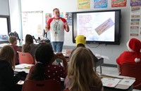 fourth grade students participating in holidays around the world activity