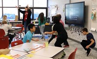 fourth grade students participating in holidays around the world activity