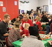 students and family members at pre-k family day