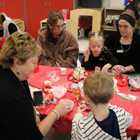 students and family members at pre-K family day