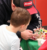 students and family members at pre-K family day