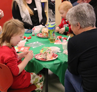 students and family members at pre-K family day