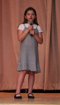 student participating in talent show