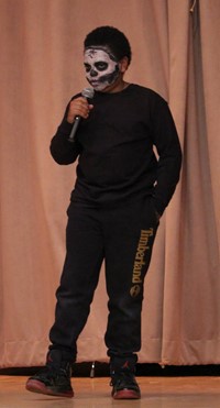 student participating in talent show