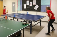 students playing ping pong