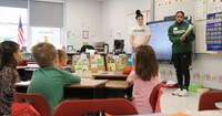 Binghamton University Athletes reading to Port Dickinson Elementary students