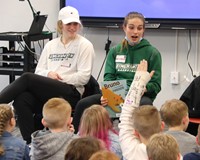 Binghamton University Athletes reading to Port Dickinson Elementary students