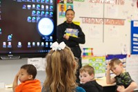 Binghamton University Athletes reading to Port Dickinson Elementary students