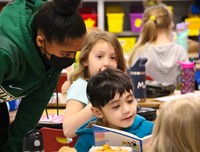 Binghamton University Athletes reading to Port Dickinson Elementary students