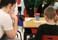 Binghamton University Athletes reading to Port Dickinson Elementary students