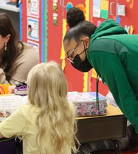 Binghamton University Athletes reading to Port Dickinson Elementary students