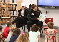 Binghamton University Athletes reading to Port Dickinson Elementary students