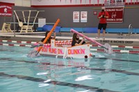 students participating in cardboard boat races