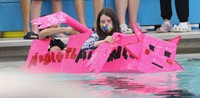 students participating in cardboard boat races