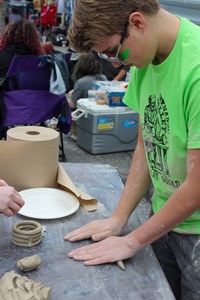 students working on feats of clay activity