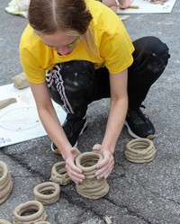 students working on feats of clay activity