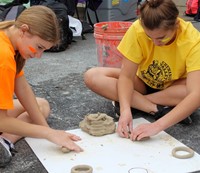 students working on feats of clay activity