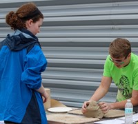 students working on feats of clay activity