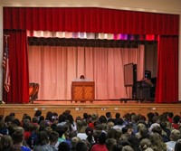 student playing piano at talent show