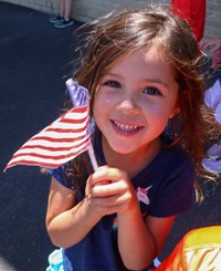 student at flag day celebration