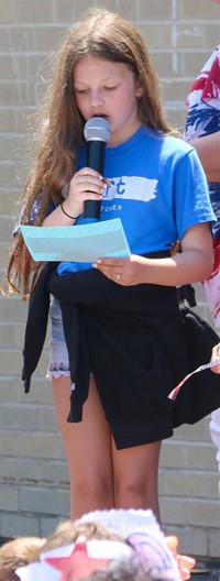 student at flag day celebration