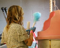 person making cotton candy