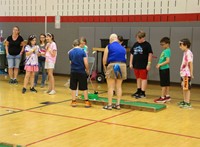 people playing mini golf